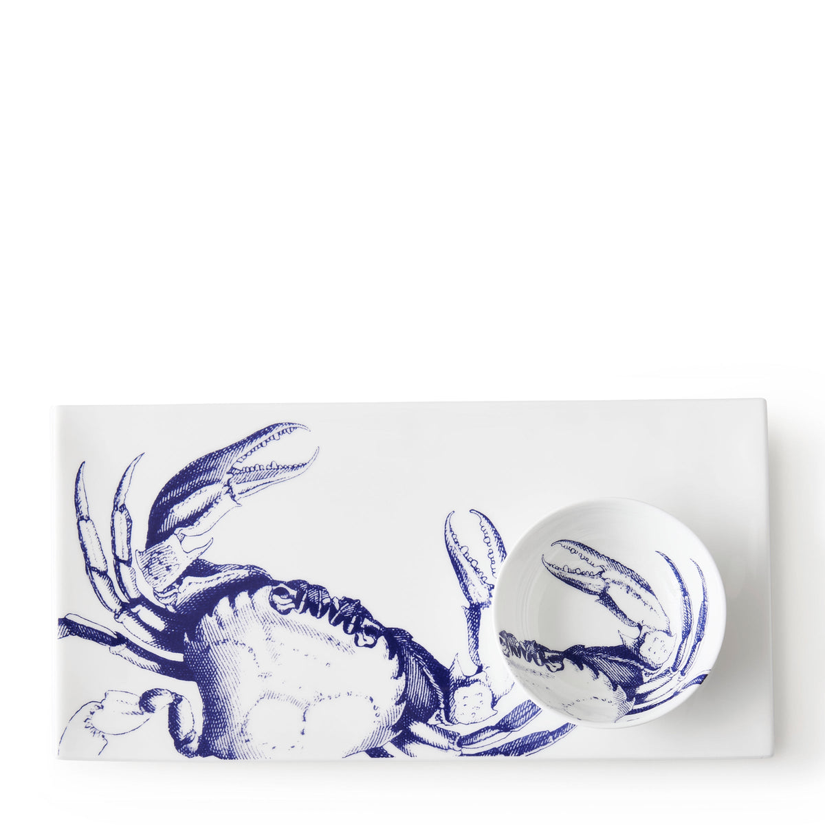 A rectangular white platter featuring a detailed crab pattern illustration, paired with a small round bowl for serving sauces, placed on the right side of the platter from the Caskata Crab Dipping Dishes, Set of 4.