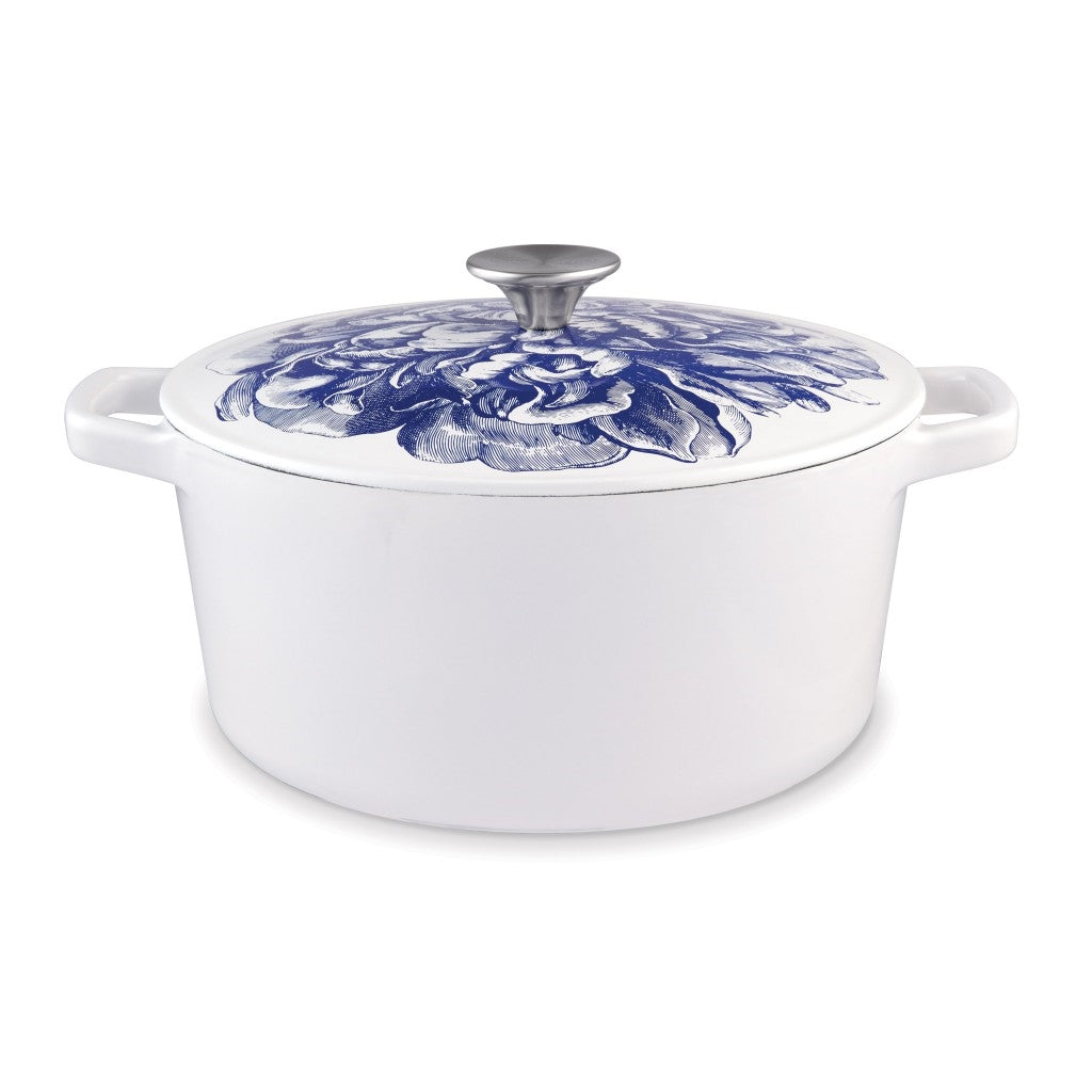 A white and blue Caskata X Cuisinart Limited Edition Peony Enameled Cast Iron 5 Qt. Round Casserole with Lid known for its heat retention.