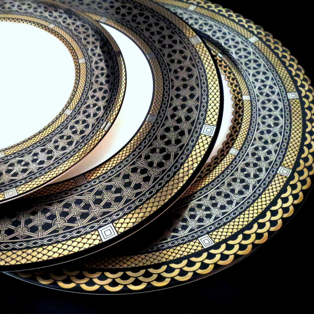 A set of Hawthorne Onyx Gold &amp; Platinum Dinner Plates with elegant gold and black designs by Caskata Artisanal Home.