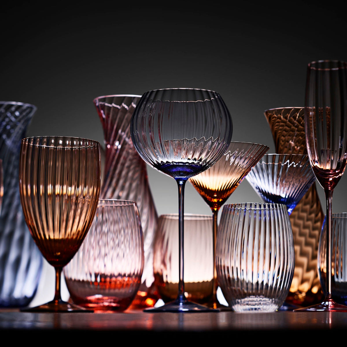 A colorful display of Quinn handblown glassware by Caskata.