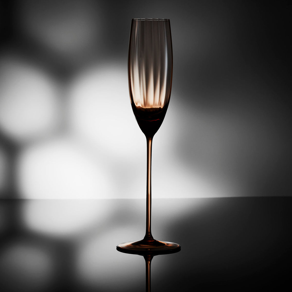 Quinn Amber brown long-stemmed champagne flutee glasses sold in sets of 2 mouth blown crystal from Caskata