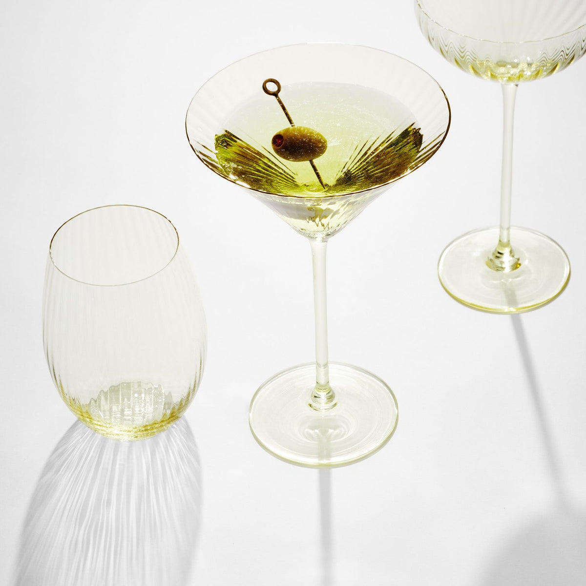 The perfect cocktail in a Quinn citrine yellow martini glass by Caskata.