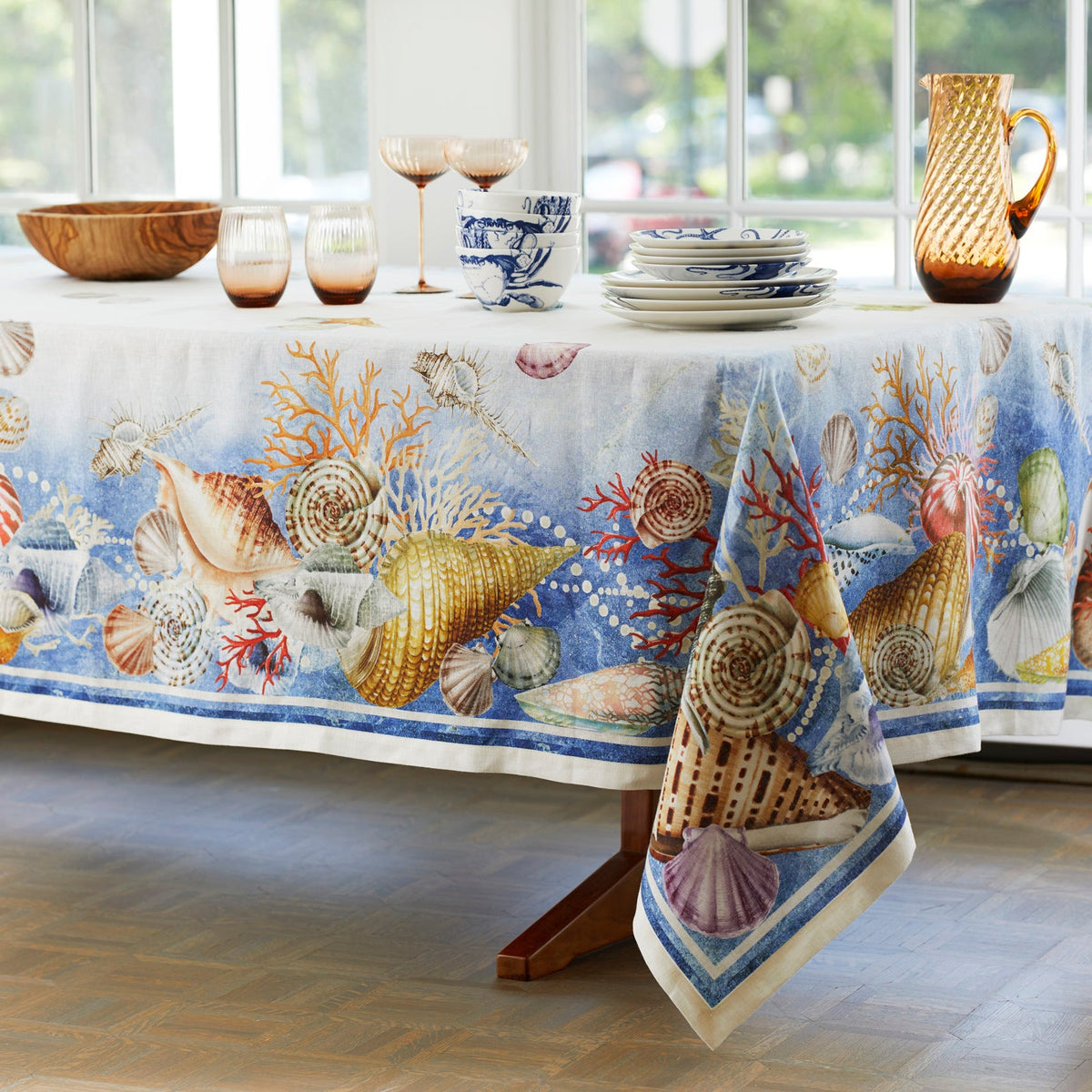 A Sanibel Linen Tablecloth from TTT, blue and white.