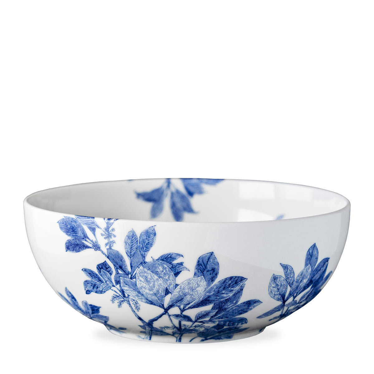 Caskata Artisanal Home&#39;s Arbor Vegetable Serving Bowl with a blue floral and leaf design, crafted from premium porcelain. Dishwasher safe.