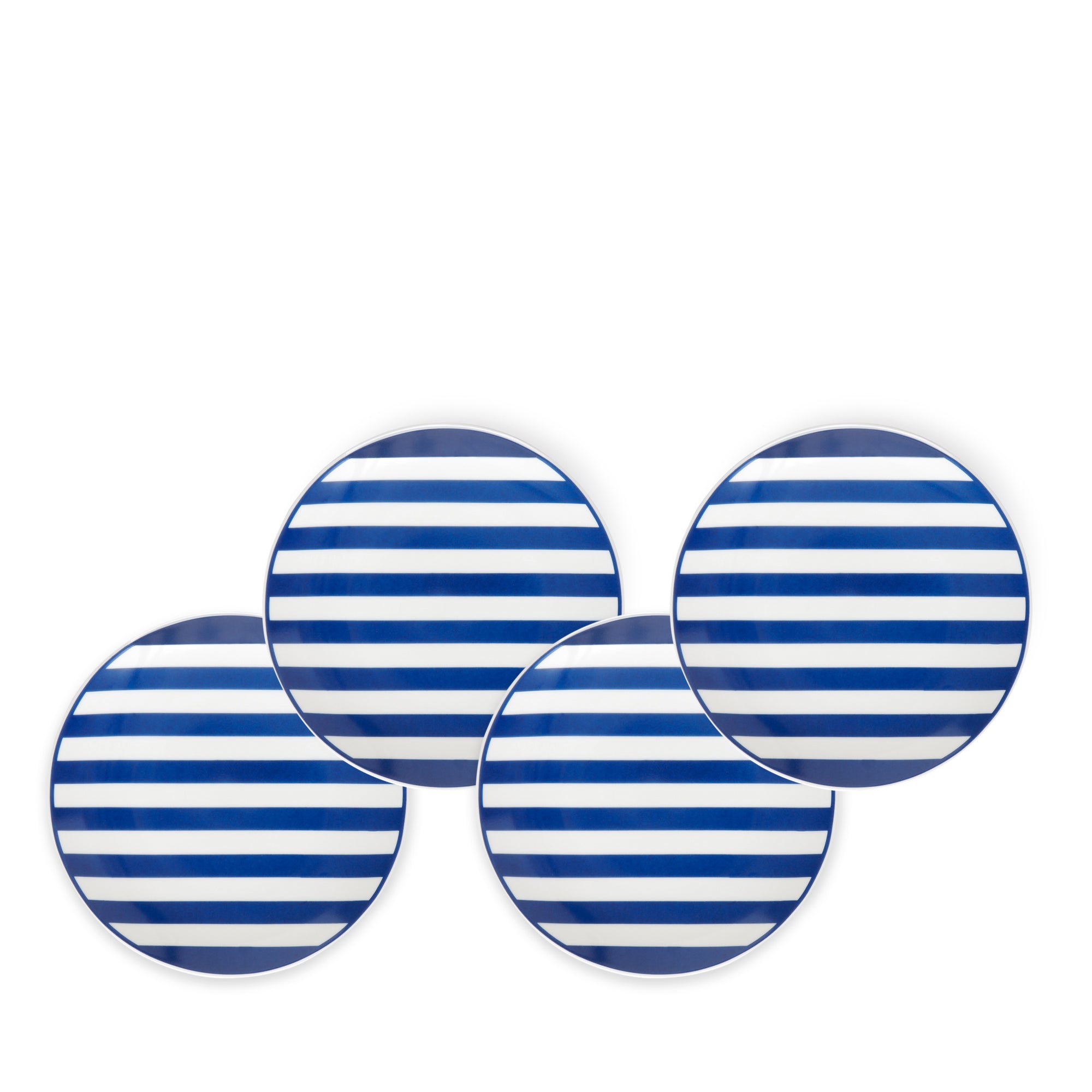 Four round porcelain Beach Towel Stripe Small Plates by Caskata Artisanal Home are arranged in a slightly overlapping pattern on a plain white background.
