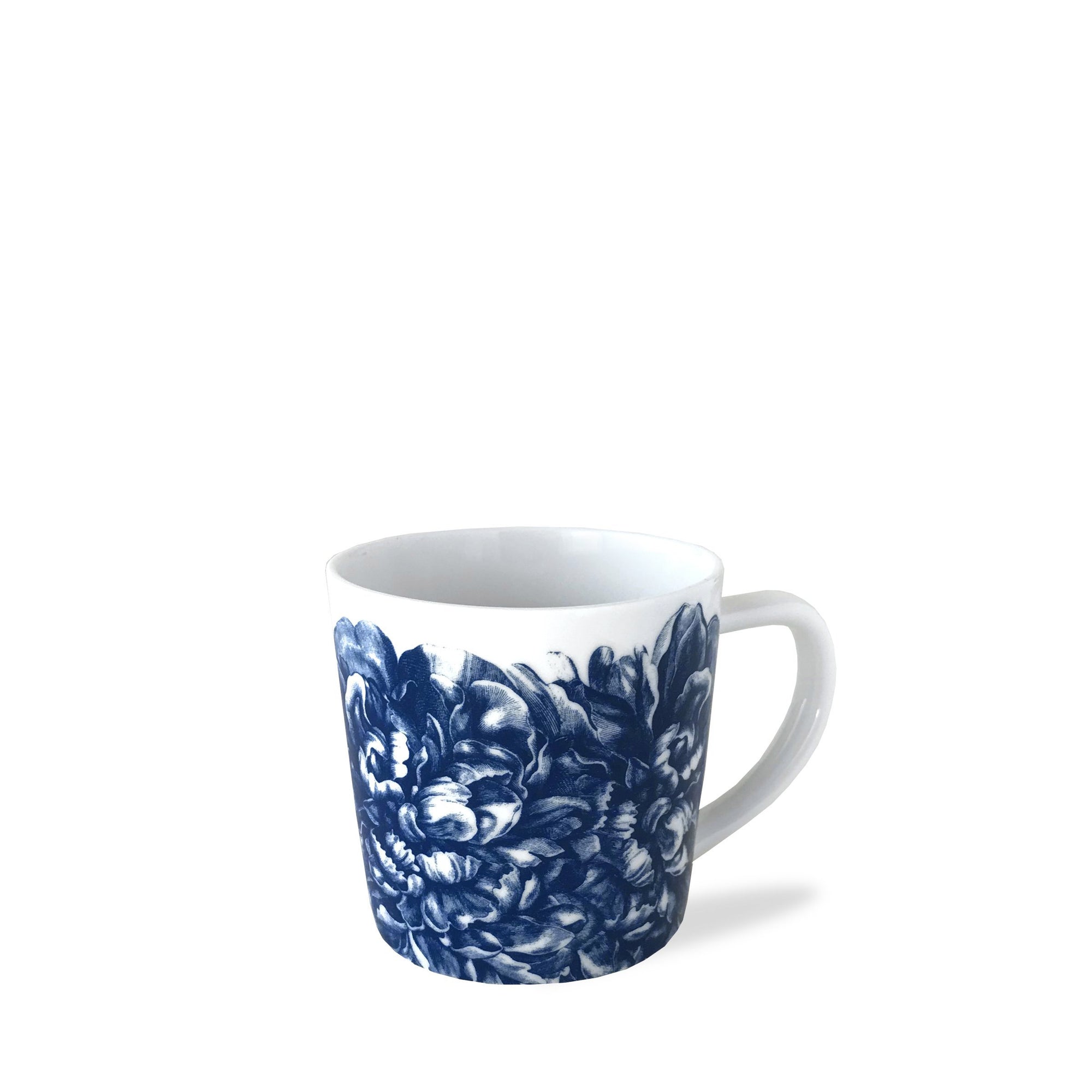 A Peony Mug from Caskata Artisanal Home, with a blue floral pattern, isolated on a white background.