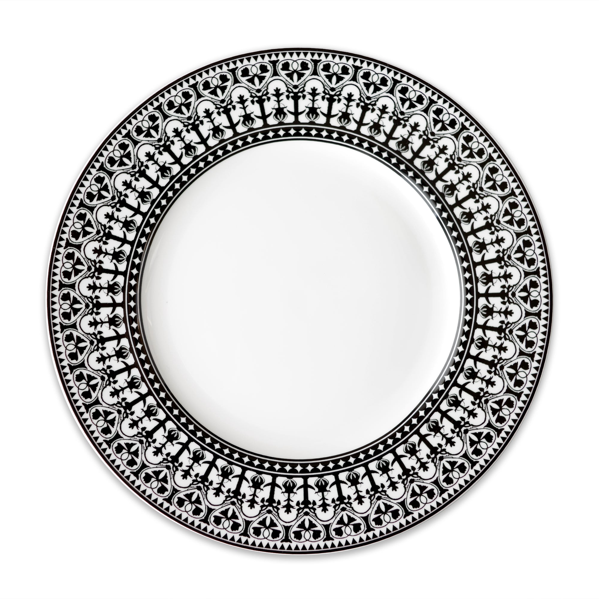 A Casablanca Rimmed Dinner Plate from Caskata Artisanal Home, featuring an intricate black floral pattern around the rim and hand-decorated details.