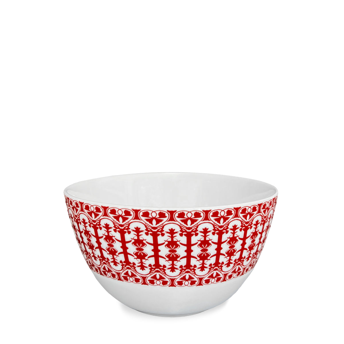 A high-fired porcelain bowl featuring an intricate red pattern around its exterior, embodying the charm of Caskata&#39;s Casablanca Crimson Cereal Bowl.