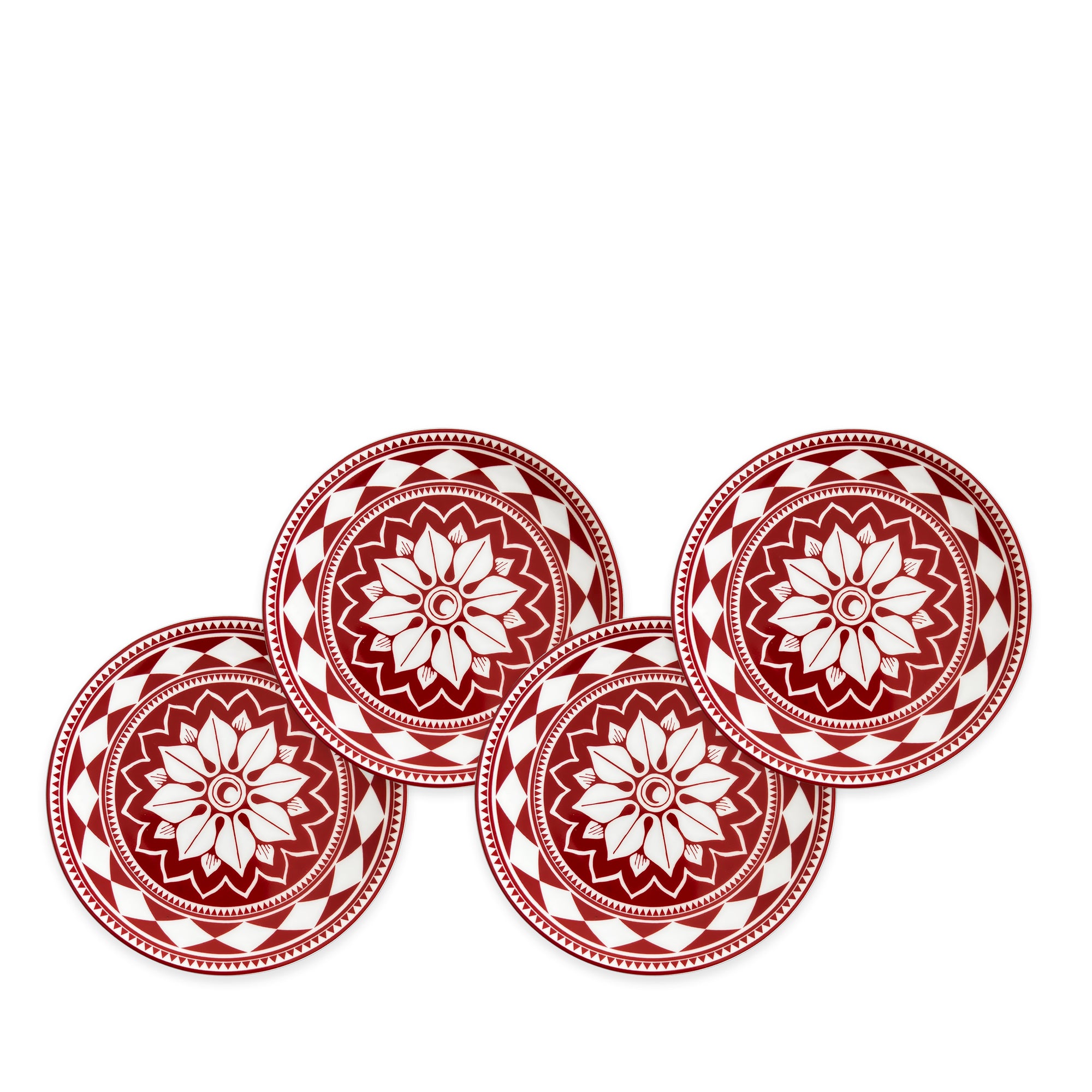 Four red and white ceramic plates with bold geometric floral designs are arranged in a slightly overlapping line against a white background, showcasing Fez Crimson Small Plates by Caskata Artisanal Home—heirloom-quality dinnerware perfect for any entertaining powerhouse.
