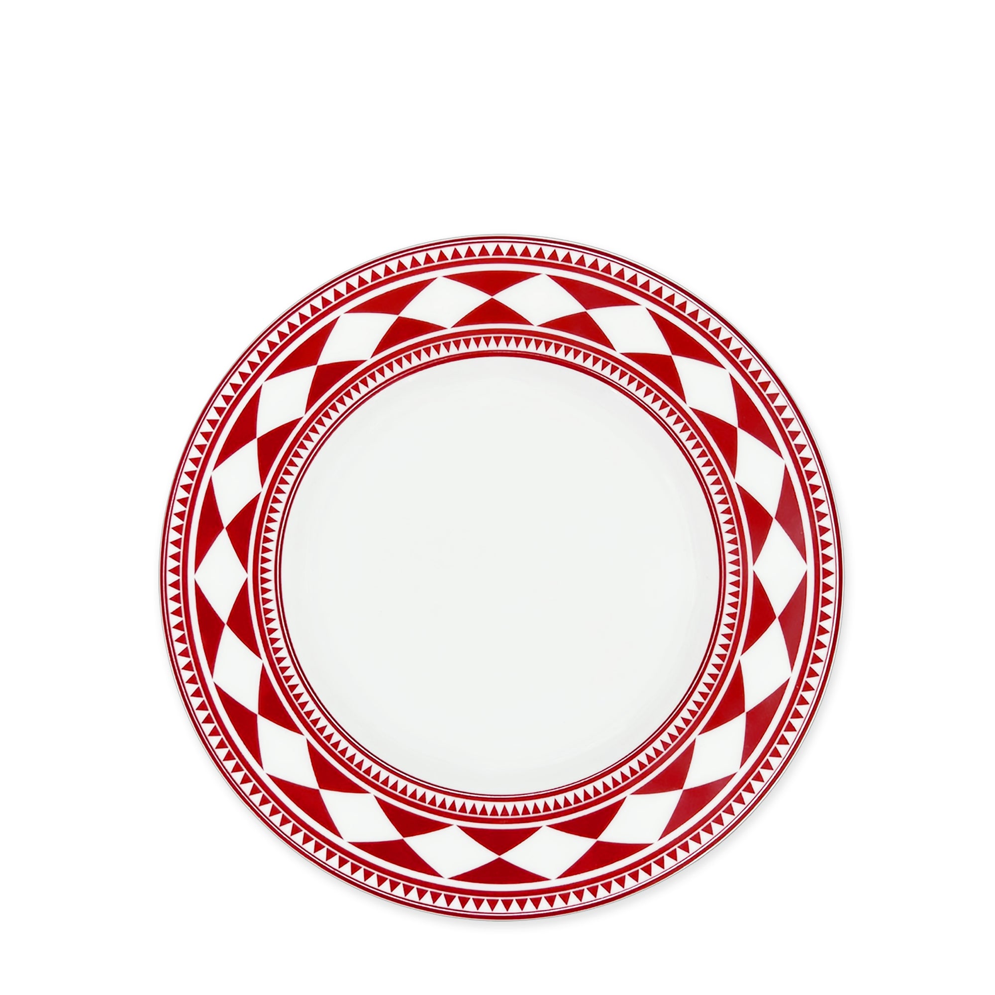 A Fez Crimson Rimmed Salad Plate from Caskata Artisanal Home, crafted from high-fired porcelain, features a white ceramic base adorned with a striking red and white geometric border inspired by Moroccan patterns of diamonds and triangles.