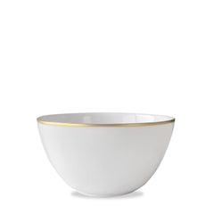 A sleek, versatile collection piece, the **Grace Gold Cereal Bowl by Caskata Artisanal Home** is crafted from lead-free high-fired porcelain. It features a thin gold rim around the top edge and is set against a plain white background. The empty white ceramic design exudes elegance and simplicity.
