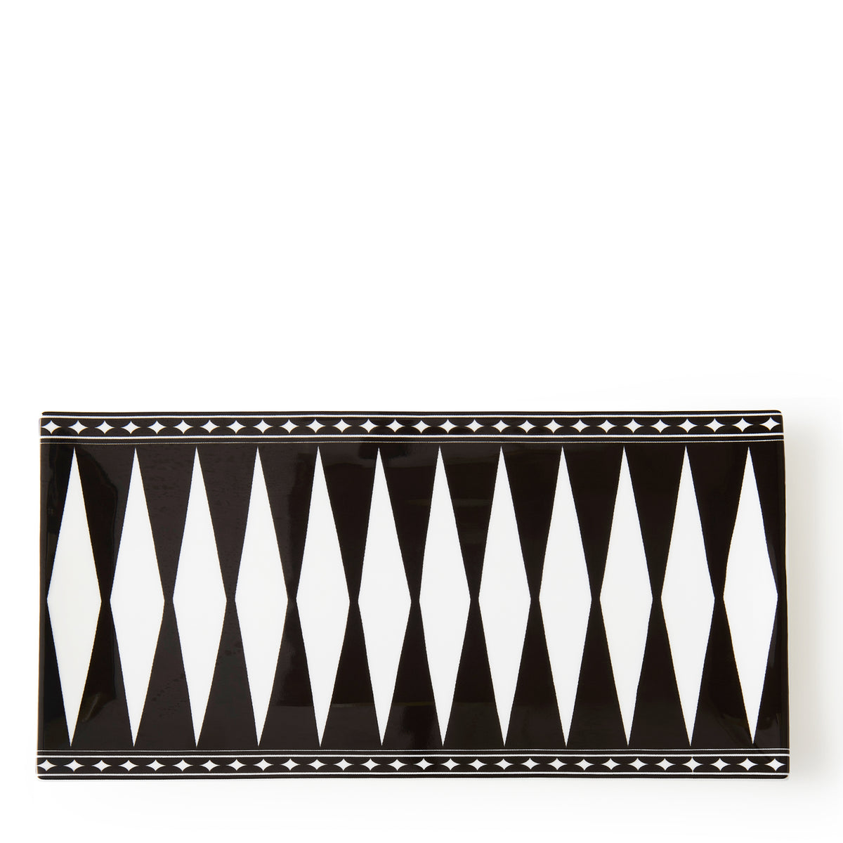 A rectangular bone china tray featuring a black and white geometric pattern with a diamond design along the center and a border of small triangles, perfect for serving appetizers, the Marrakech Large Sushi Tray by Caskata.