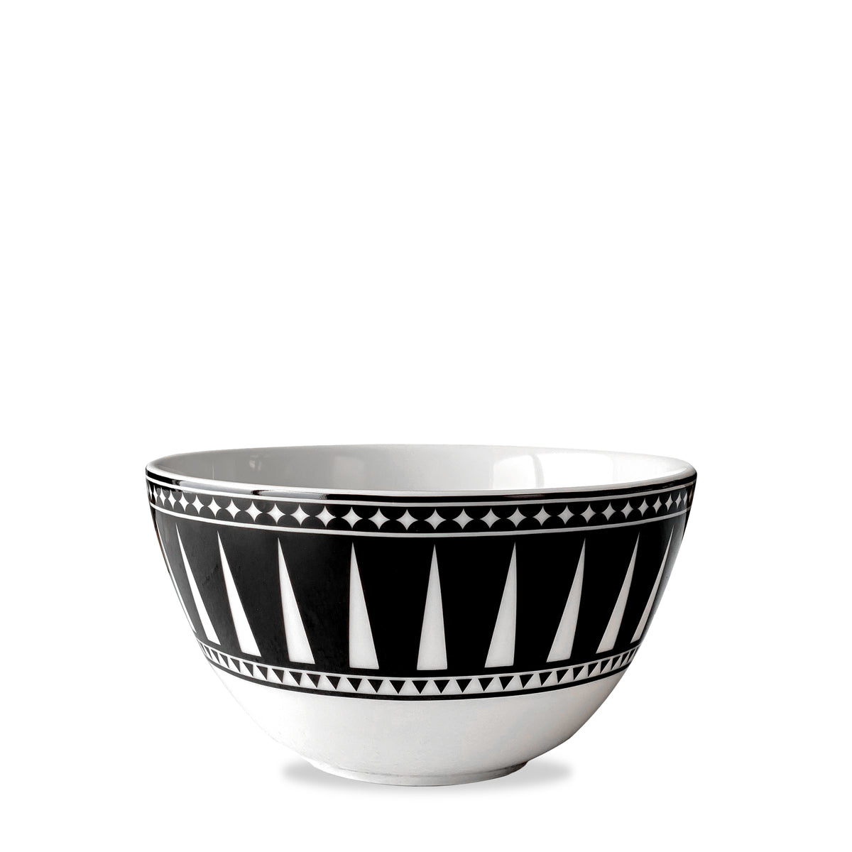 A white high-fired porcelain bowl with a black geometric pattern around the exterior, reminiscent of Art Deco inspired ceramics, the Marrakech Cereal Bowl by Caskata Artisanal Home.