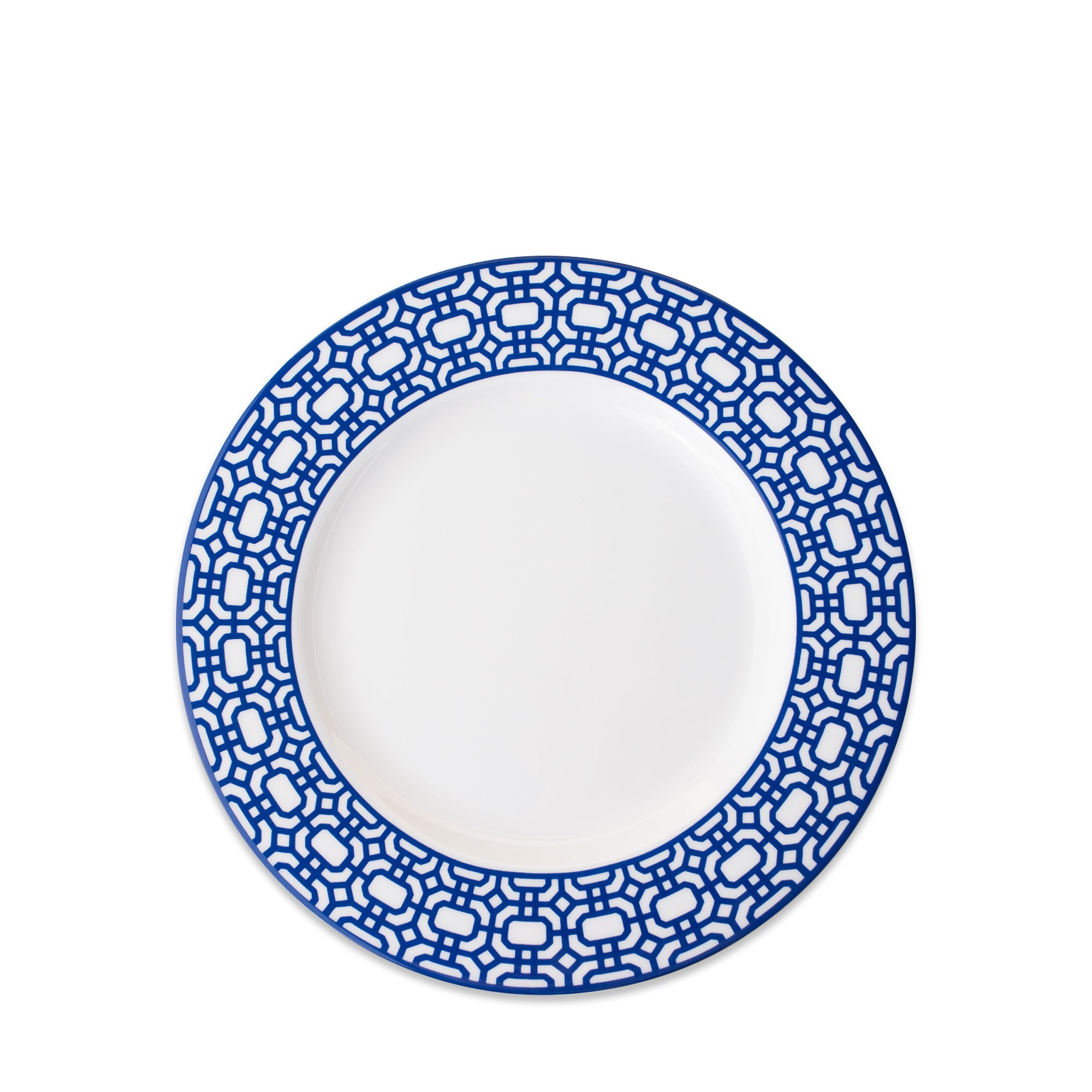 A Newport Garden Gate Rimmed Salad Plate with a blue geometric pattern around the rim, crafted from premium porcelain by Caskata Artisanal Home, perfect for adding a touch of elegance to any table setting.