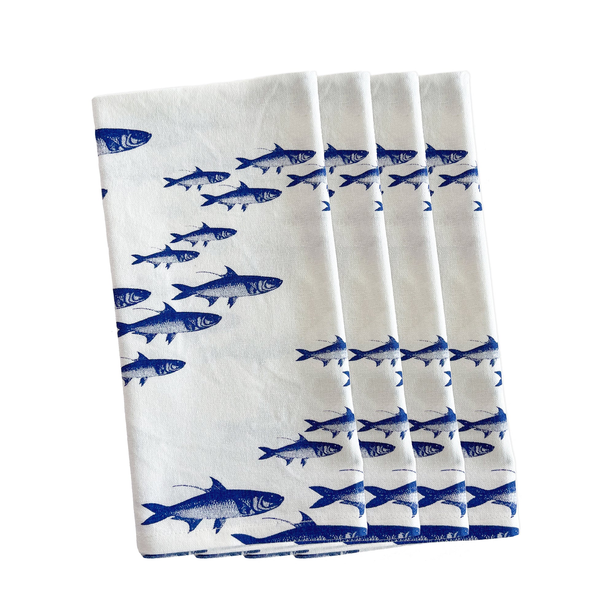 A white 100% cotton kitchen towel with a School of Fish Dinner Napkins, Set of 4 design, neatly folded on a plain background by Caskata.