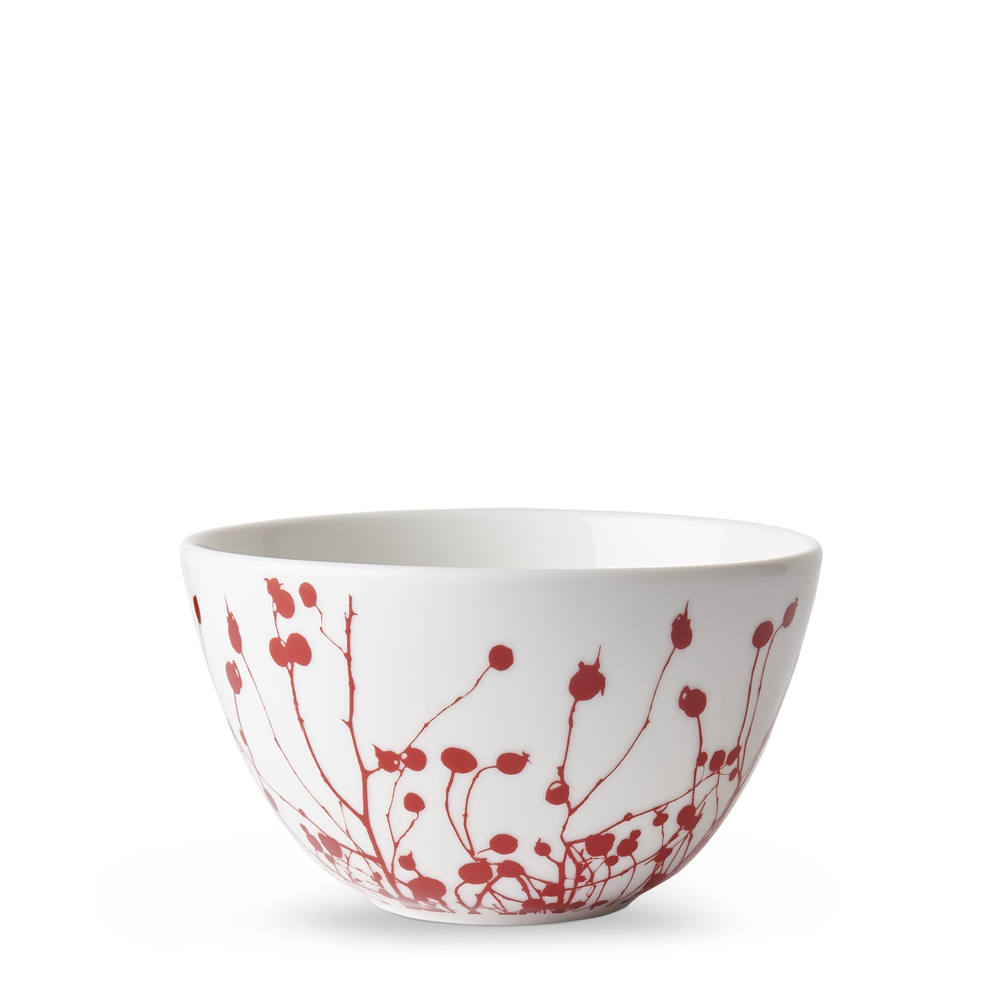 White ceramic bowl with a red abstract floral pattern on the exterior, reminiscent of winter berries. This Winterberries Cereal Bowl by Caskata Artisanal Home is also dishwasher safe for your convenience.