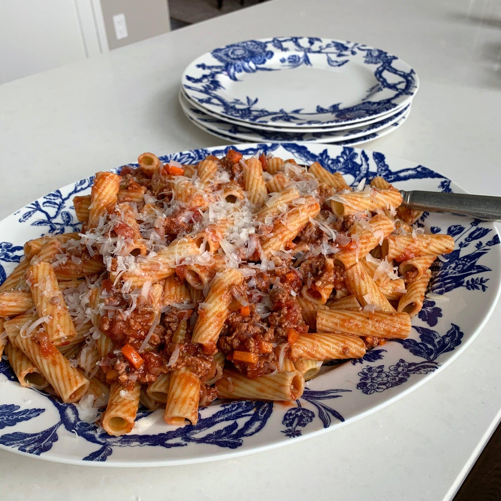 Pasta Bolognese and Rigatoni Caskata Arcadia Platter and Caskata Arcadia Dinner Plate