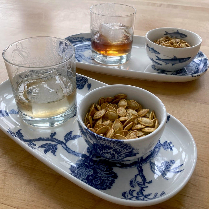 Spiced roasted pumpkin seeds on Caskata Arcadia Snack Set and Lucy on-the rocks-glass