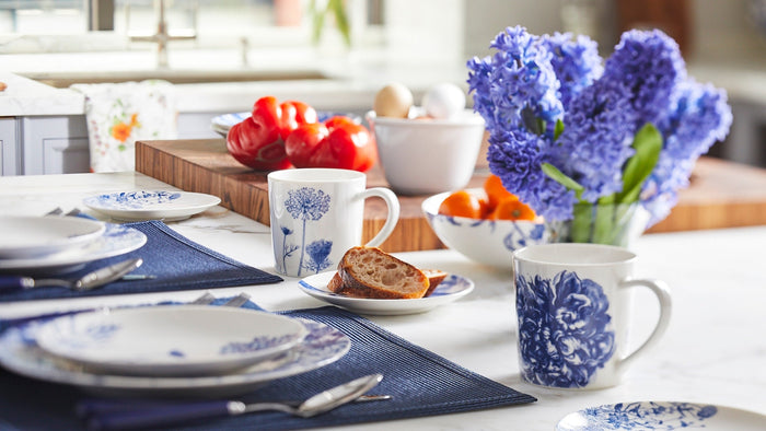 Blue and white Caskata dinnerware and mugs