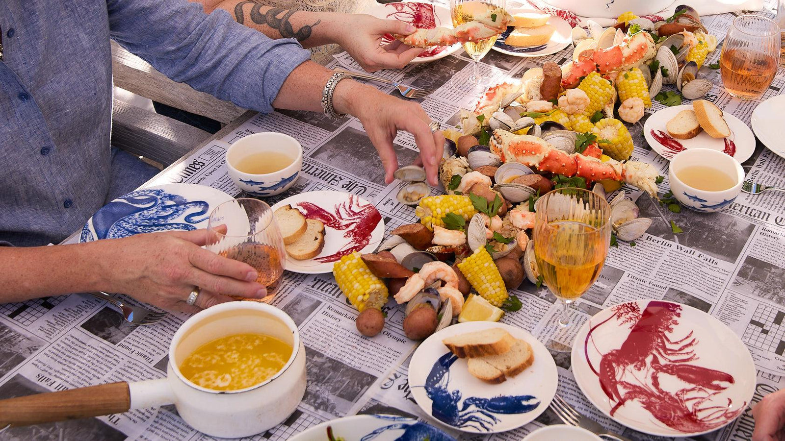 A set of blue and white plates with crabs on them.