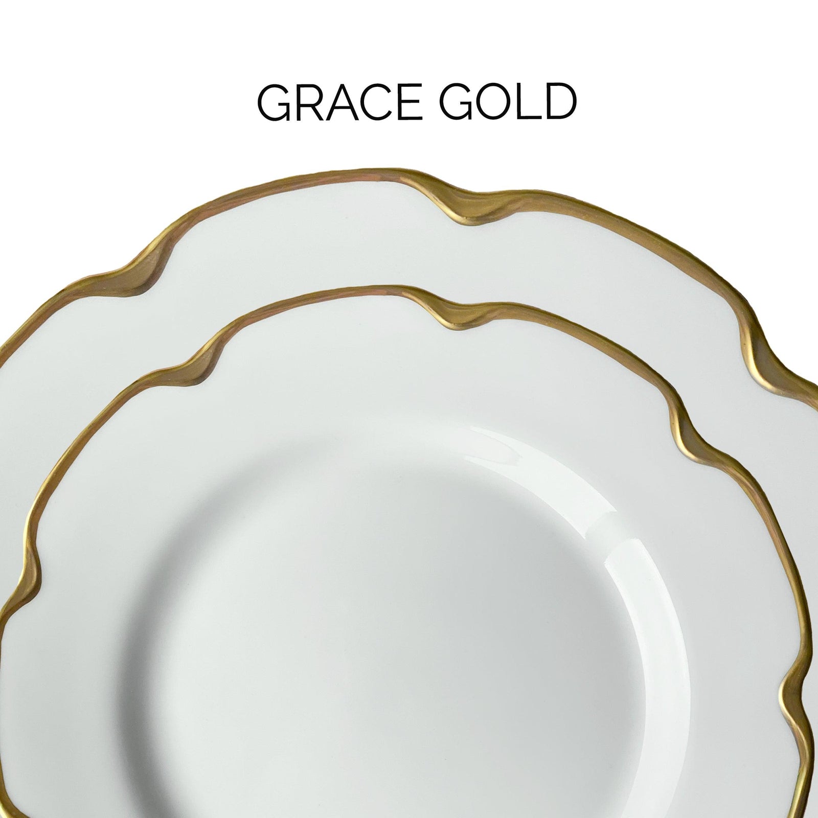 Two white plates with wavy gold rims are stacked. The text "GRACE GOLD" is above them.