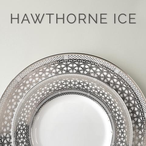 Close-up of two intricately patterned plates in grayscale shades with the text "HAWTHORNE ICE" above them.