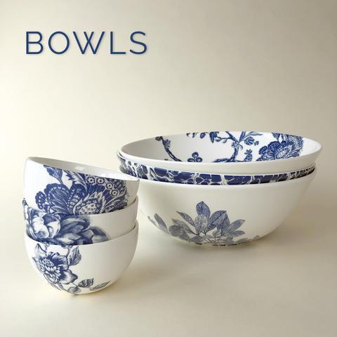 Three ceramic bowls with blue floral patterns, stacked and arranged against a neutral background, labeled "bowls.