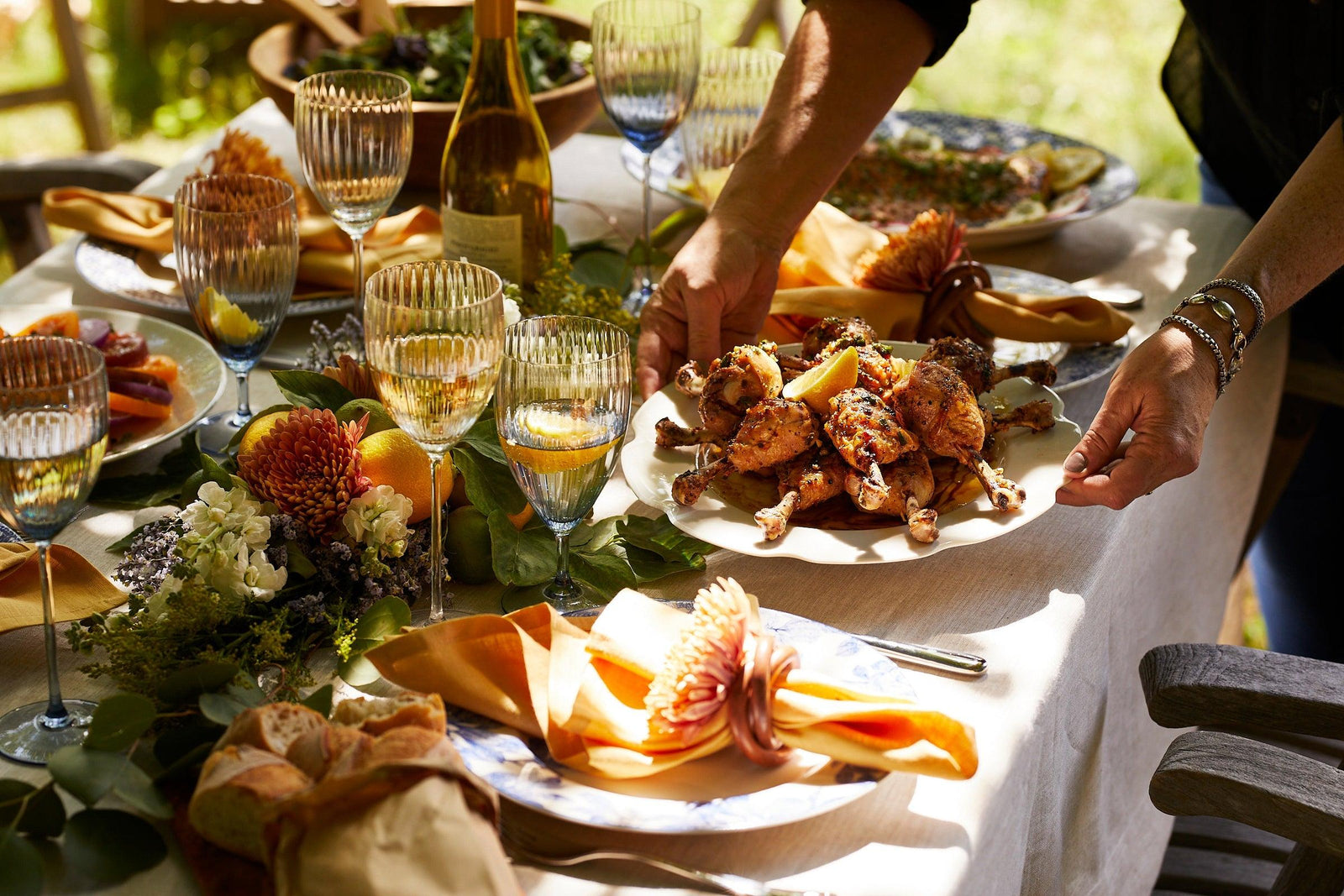 A table with food and glasses.