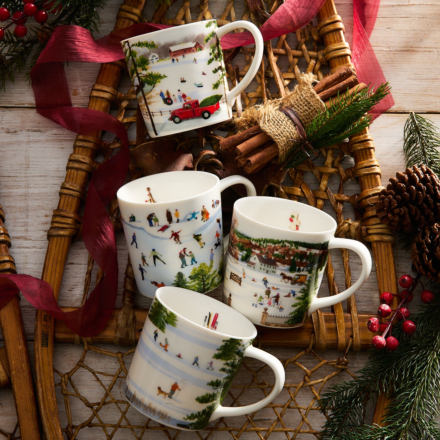 The Caskata X Felix Doolittle Winter Wonderland Mugs, Set of 4, feature delightful watercolor illustrations by Felix Doolittle showcasing winter scenes with people skating, sledding, and enjoying various outdoor activities. The designs beautifully capture snowy landscapes adorned with trees, buildings, and vehicles. These white ceramic mugs are perfect as festive gift sets for the holiday season.