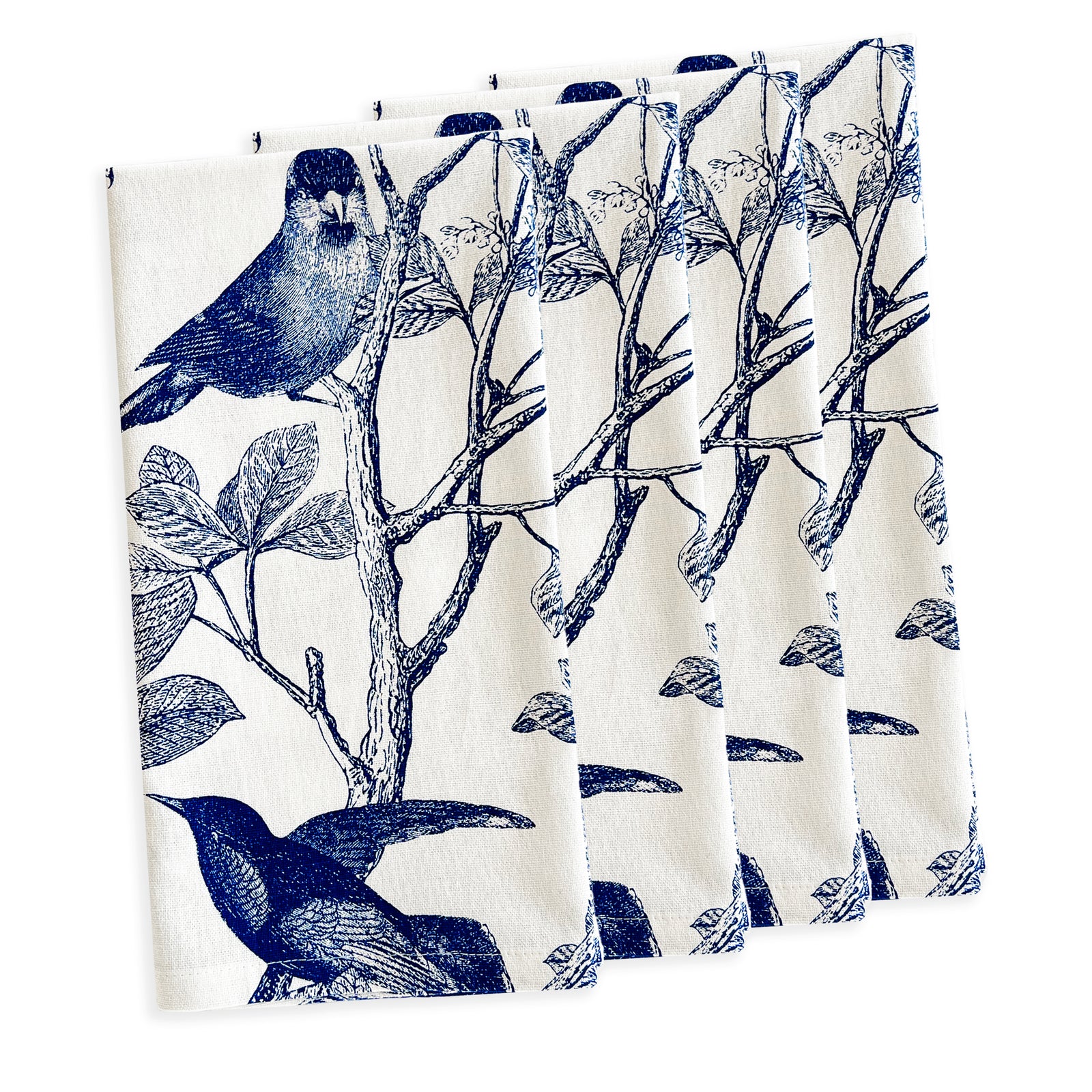 The Arbor Birds Blue Dinner Napkins by Caskata are a set of five white, 100% cotton napkins adorned with a blue Arbor pattern of perched birds and branches. Machine washable, they add elegance to any setting.