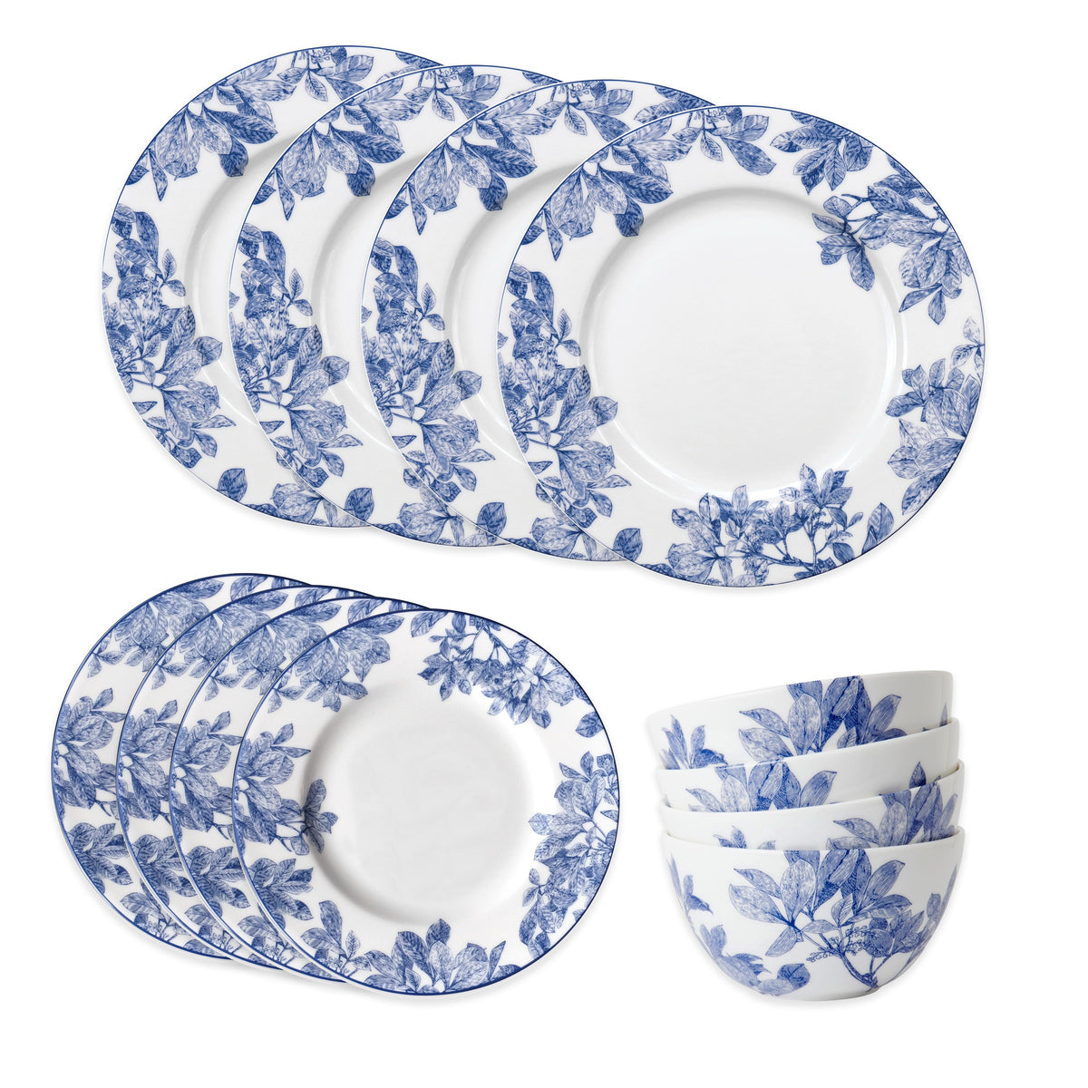 The Caskata Arbor Table for 4 is a 12-piece blue and white porcelain dinnerware set with a leafy branch design. Includes six plates and four bowls. Dishwasher and microwave safe for daily use.