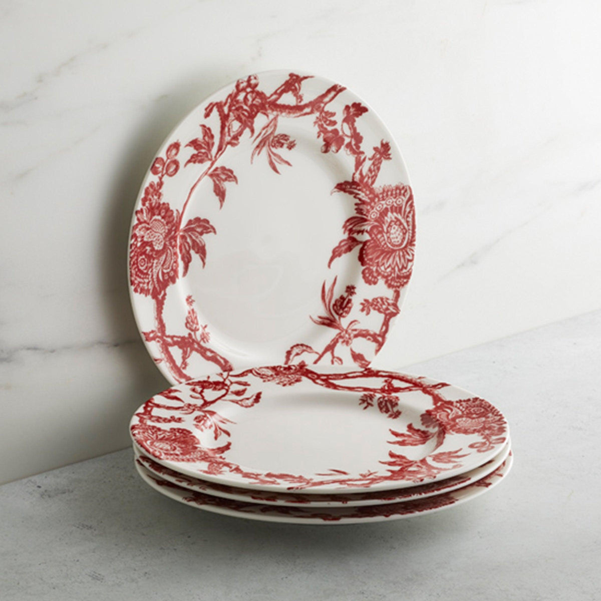 A set of Arcadia Salad Plate Crimson by Caskata Artisanal Home on a holiday table.