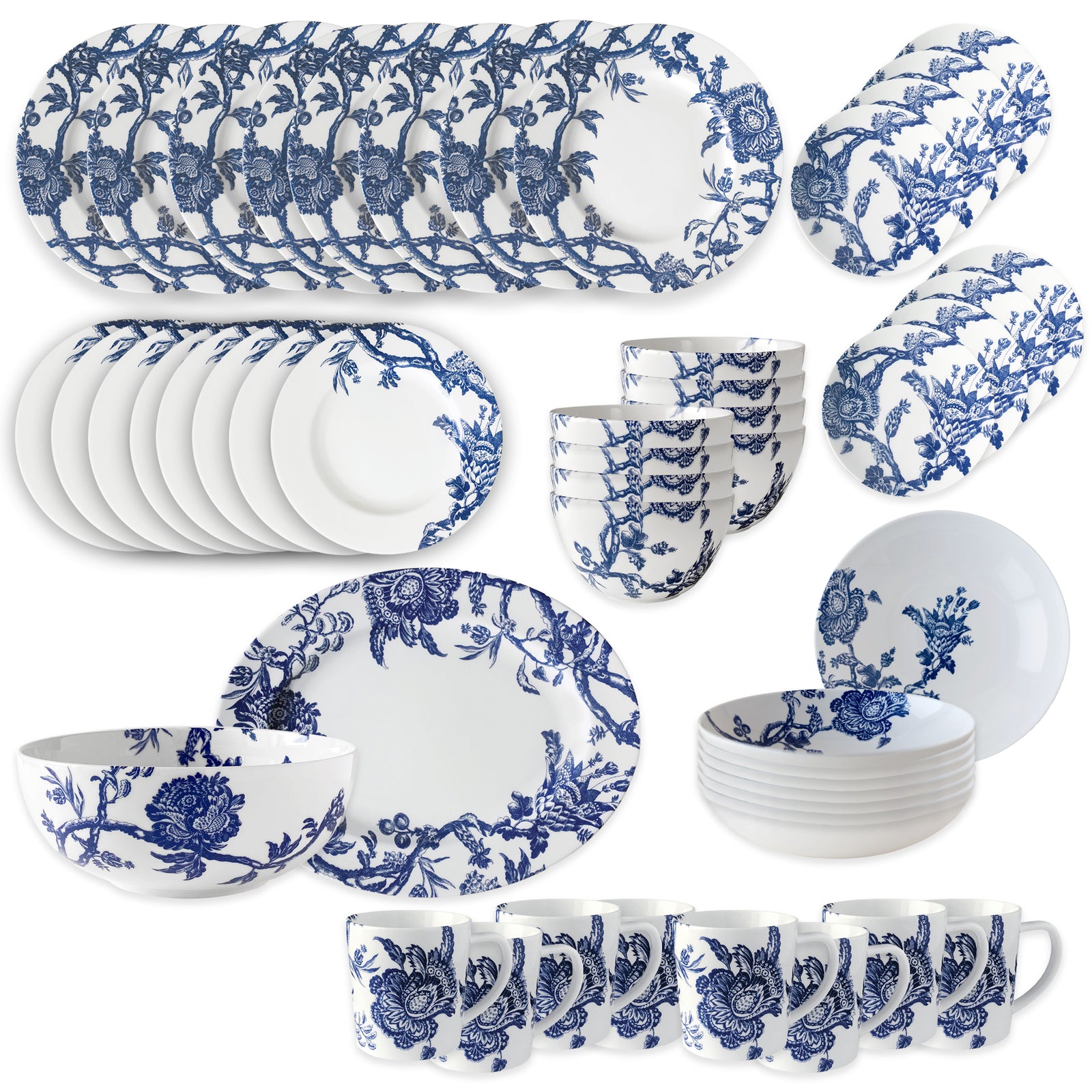 The Caskata Arcadia Ultimate Set is a 24-piece porcelain dinnerware collection with white dishes, bowls, and mugs adorned with blue floral patterns, ideal for daily use and beautifully arranged on a white background.