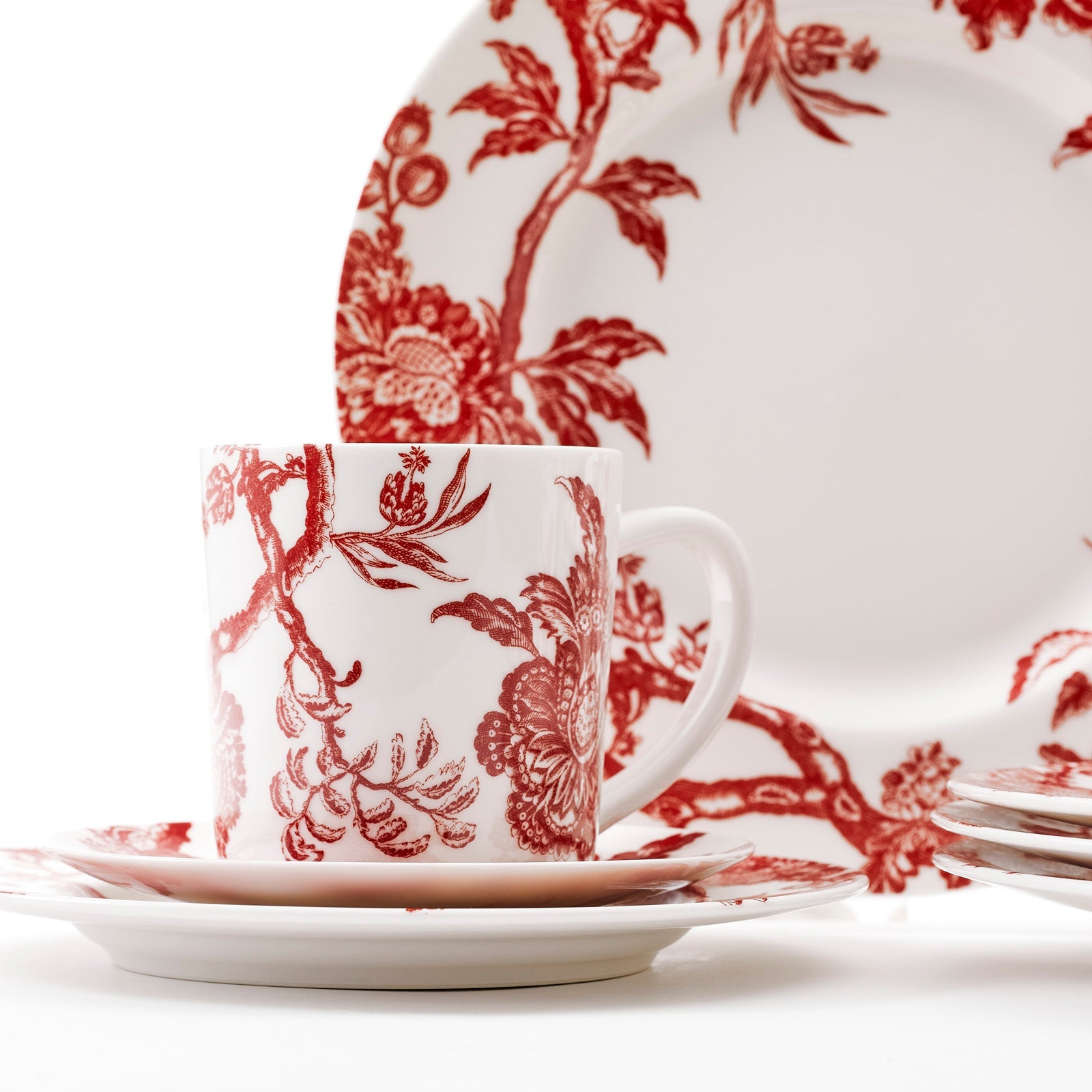 Arcadia Crimson 16 Piece dinnerware Set for 4 in high-fired porcelain from Caskata. Set includes 4 dinner plates, 4 salad plates, 4 canape plates, and 4 mugs.