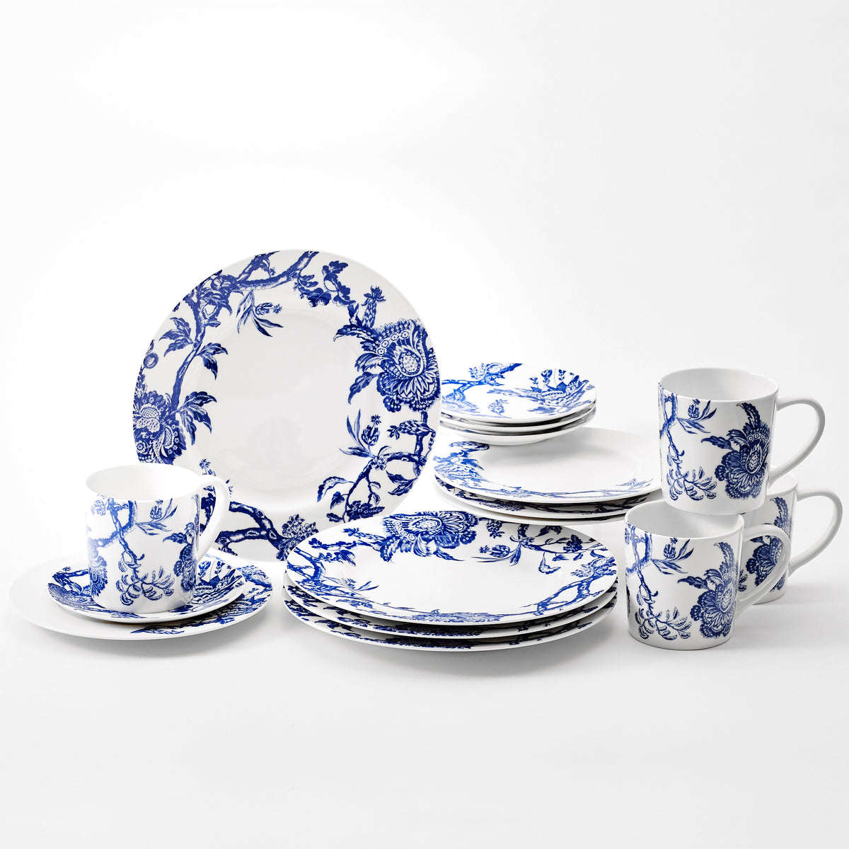 Arcadia 16 piece dinnerware set from Caskata. Set includes 4 dinner plates, 4 salad plates, 4 canape plates and 4 mugs in high-fired porcelain from Caskata.