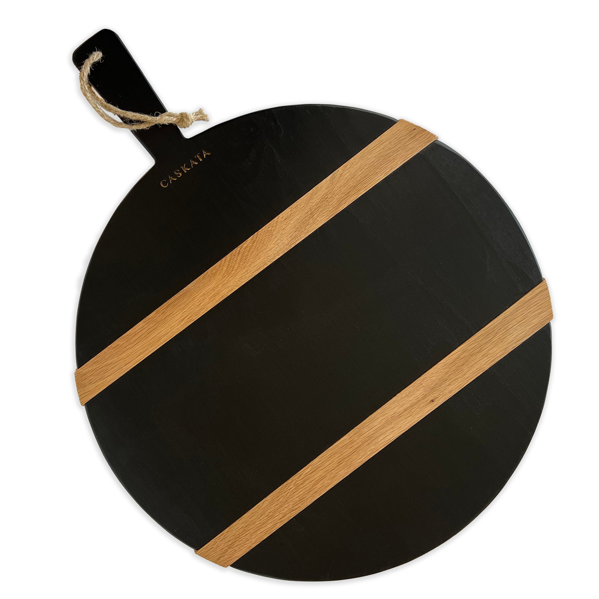 Oversized Round Charcuterie Serving Board in Black with Contrasting Natural Stripes is made from reclaimed European Timbers, featuring one side with a textured finish and one side with a smooth finish, exclusively from Caskata. This image shows the striped side.