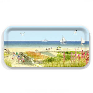 The Caskata X Felix Doolittle Beach Dunes Small Rectangular Tray by Caskata features a beach scene with people, plants, sailboats, and seagulls. Crafted in Finland as a sustainable birchwood tray.