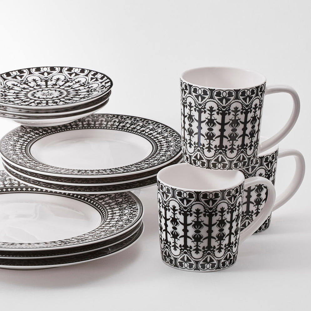 Casablanca Black and White 16 Piece dinnerware set in porcelain from Caskata sets a table for 4.