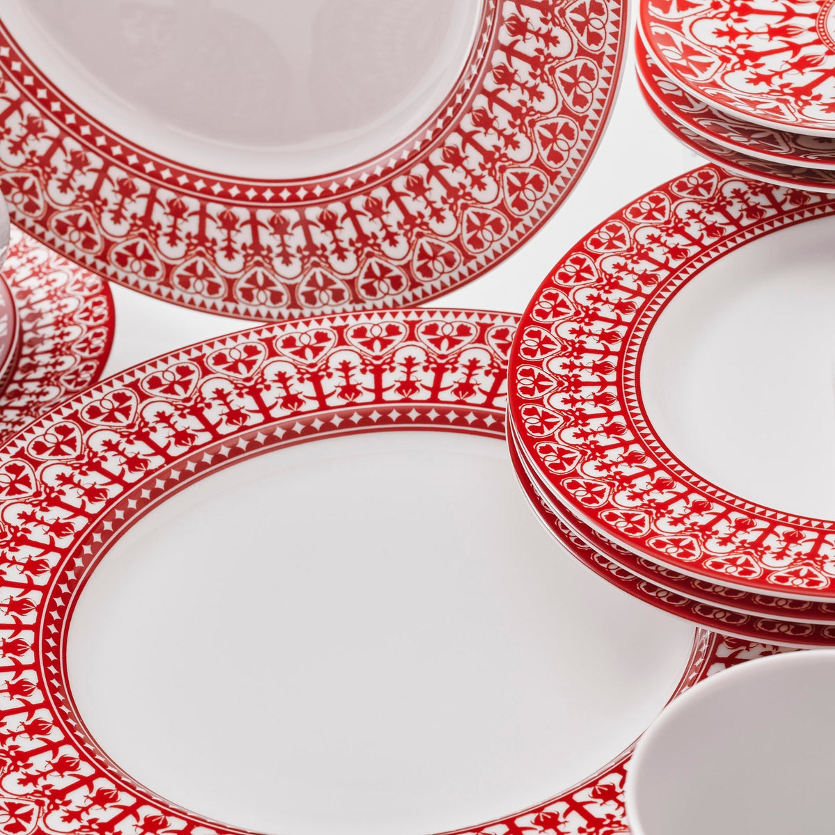 Casablanca in Crimson 16 piece dinnerware set in red and white porcelain from Caskata. Complete Table for 4