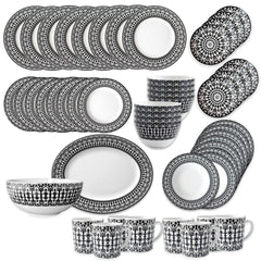 The Caskata Casablanca Ultimate Set includes 50 porcelain plates, bowls, cups, and platters with a black and white pattern on a white background. This dinnerware is stylish, dishwasher safe, and microwave safe.