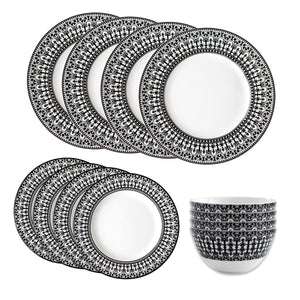 The Casablanca Table for 4 by Caskata includes six patterned dinner plates, six side plates, and six matching high-fired porcelain bowls. Dishwasher and microwave safe, all pieces are neatly displayed on a white background.