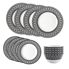 The Casablanca Table for 4 by Caskata includes six patterned dinner plates, six side plates, and six matching high-fired porcelain bowls. Dishwasher and microwave safe, all pieces are neatly displayed on a white background.