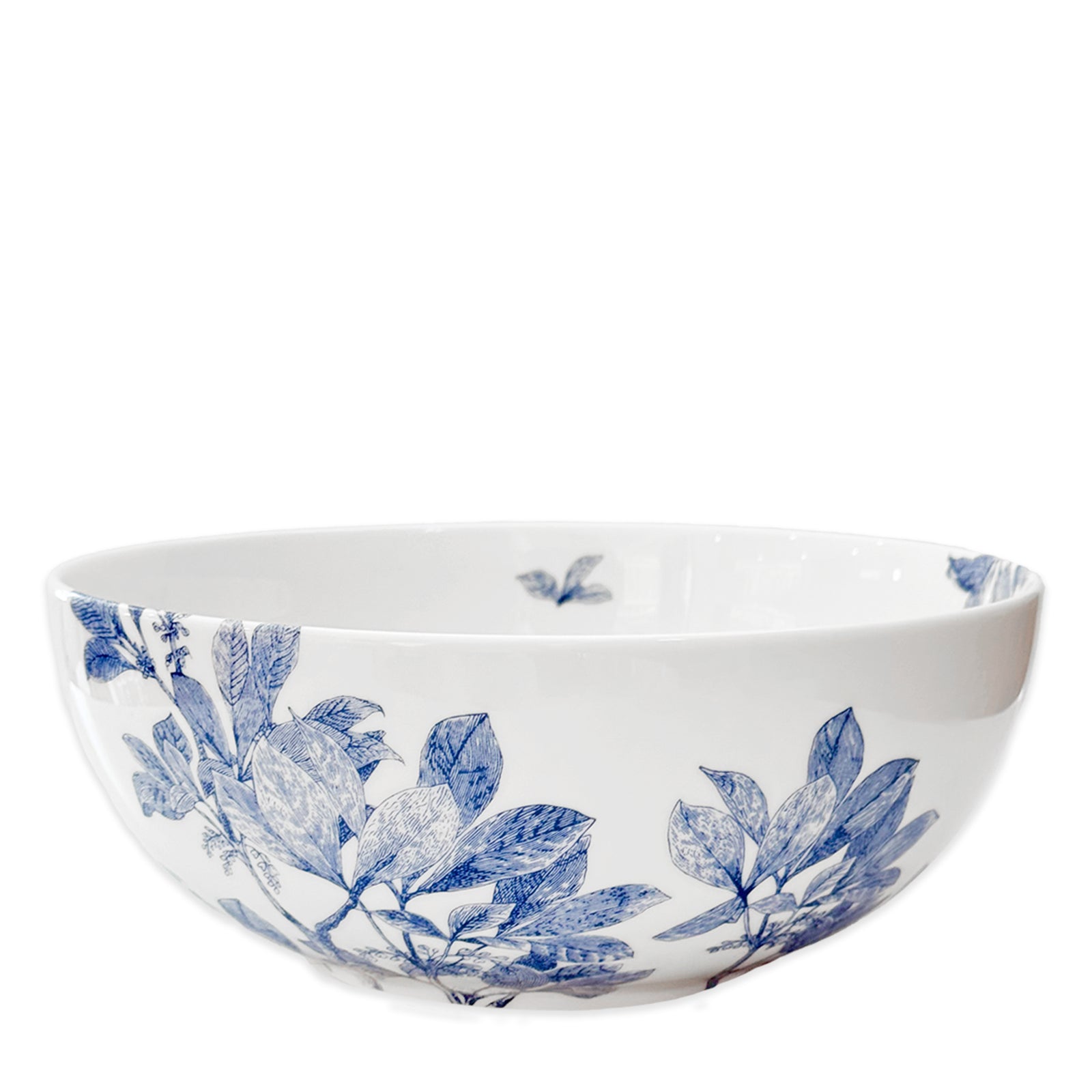Caskata Artisanal Home's Arbor Vegetable Serving Bowl with a blue floral and leaf design, crafted from premium porcelain. Dishwasher safe.