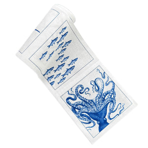 Caskata Coastal Cocktail Napkins on a roll, featuring best-selling patterns in blue and white on a cotton-linen blend that's reusable. These rolls come 50 napkins to a roll, featuring Lucy the Octopus, Horseshoe Crabs, School of Fish and Starfish patterns.