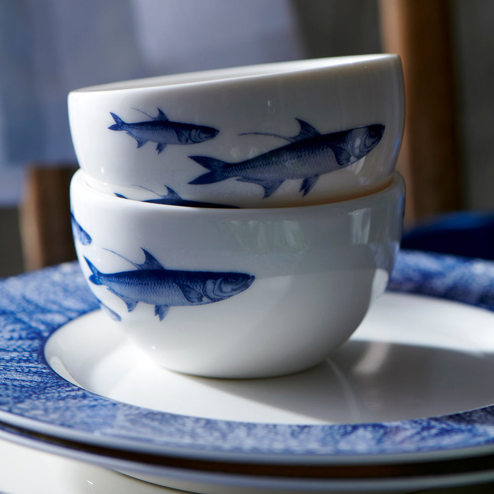 Two School of Fish Snack Bowls with Caskata Artisanal Home on them.