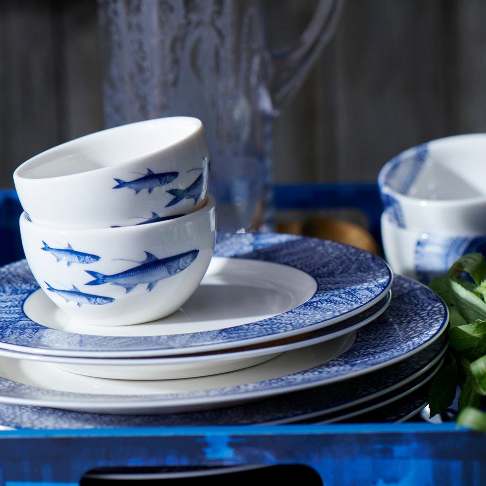 A tray full of School of Fish Snack Bowls, perfect for serving fish delicacies, from the Caskata Artisanal Home.