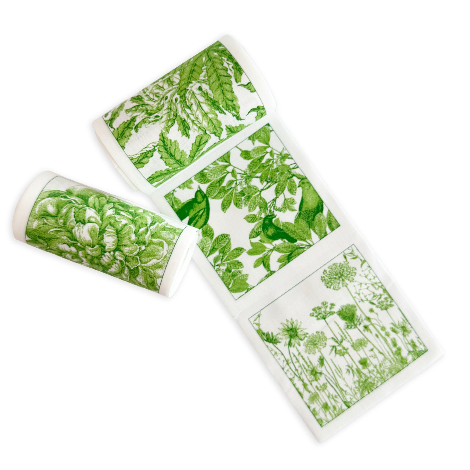 The MY DRAP Botanicals Verde Cocktail Napkin Roll features green botanical prints, adding an elegant touch to your table—ideal for pairing with floral décor or cocktail napkins.