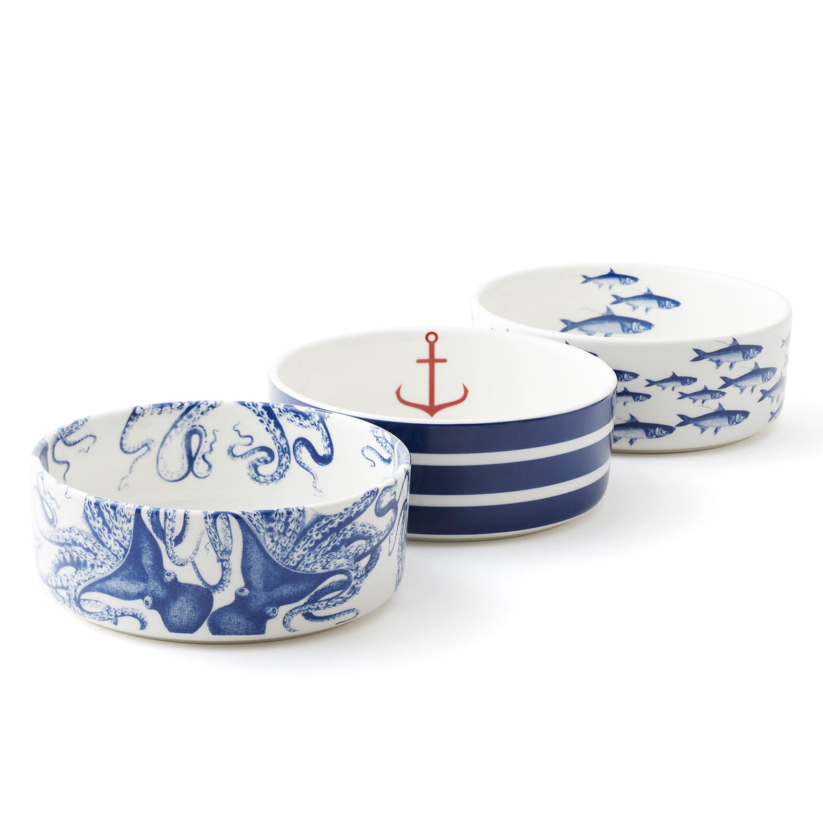 Three Caskata Lucy Medium Pet Bowls with blue and white octopus and anchor designs.