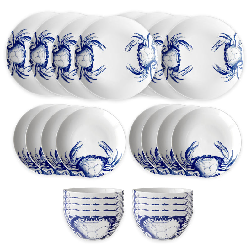 The Caskata Crab Table for 8 is a 16-piece lead-free porcelain dinnerware set featuring blue crab illustrations. Includes plates, side plates, bowls, and mugs arranged on a white background.