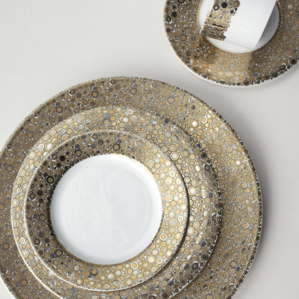 A set of Ellington Shimmer Gold &amp; Platinum Dinner Plates and utensils from the Caskata Artisanal Home collection.